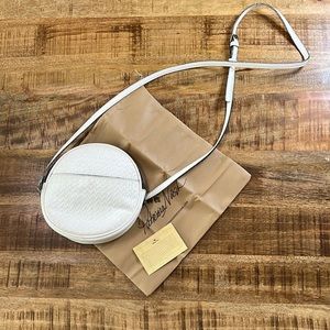 Patricia Nash white womans crossbody bag.